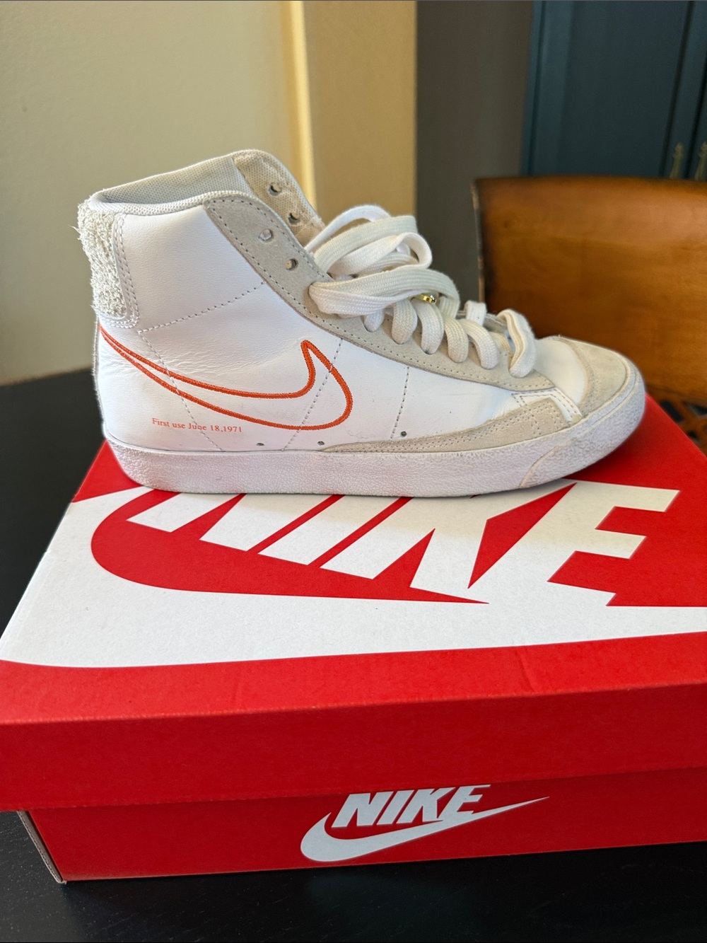 Nike Women's Blazer Mid 77 White High-Top Sneakers with Orange Swoosh